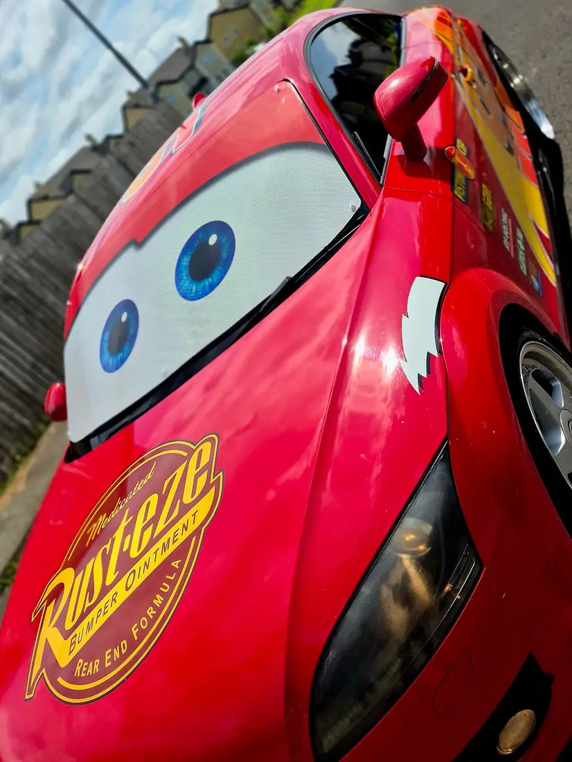 Close-up of the big cartoon eyes on the car's windscreen