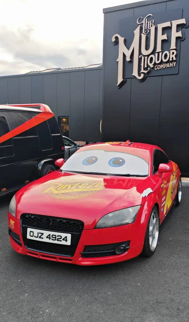 The car parked outside a venue in Muff